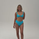 Wategos Bikini Top in Lagoon – Blue Apparel Women Showcasing the Product