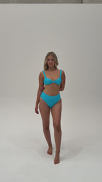 Wategos Bikini Top in Lagoon – Blue Apparel Women Showcasing the Product